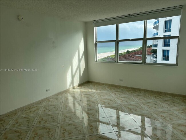 Building Photo - 6039 Collins Ave