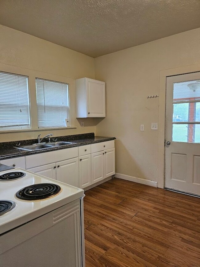 Building Photo - Two Bedroom One Bath Lower Duplex with W/D Hookup