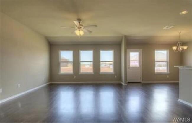 Building Photo - Stylish 4BR/2BA Home with Garage & Privacy Fence