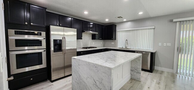 Building Photo - 4816 Magnolia Blossom Ave