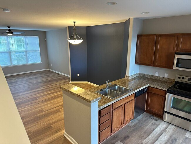 Building Photo - Large garage with attached spacious 2 bedroom townhome