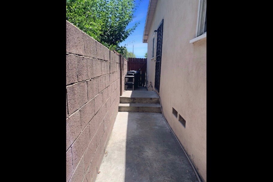 Side walkway from gate to patio - 2339 N Naomi St