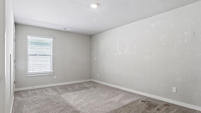 Building Photo - Limited-time offer: Reduced security deposit for well-qualified applicants. Spacious 4BR/3BA home...