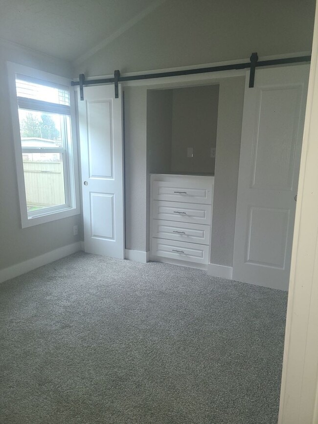 Building Photo - 55+ neighborhood. Light, bright, and move-in ready!