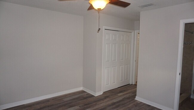 Building Photo - Four Bed - Three Bath - Large Storage Area...