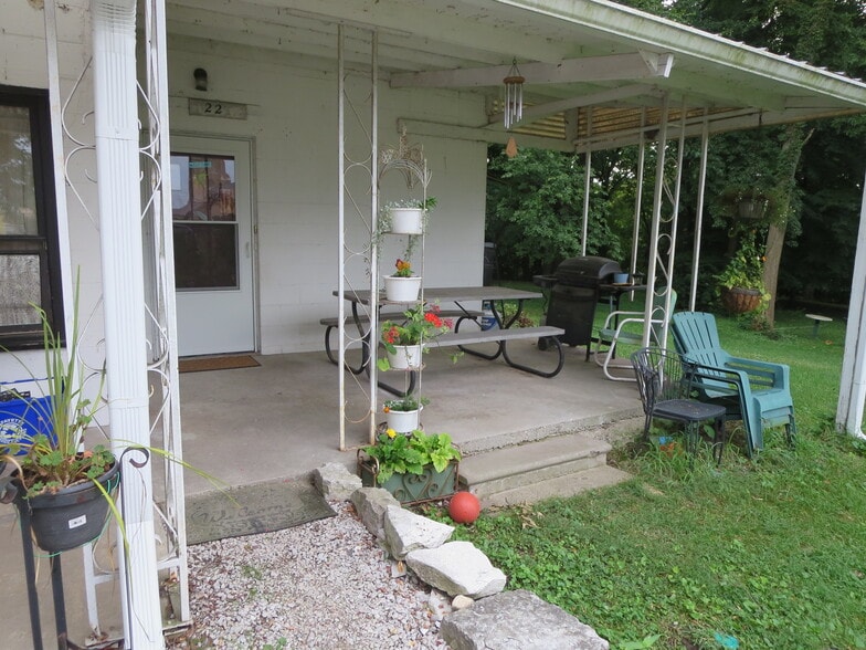 Porch with entry door. - 22 McGrath St