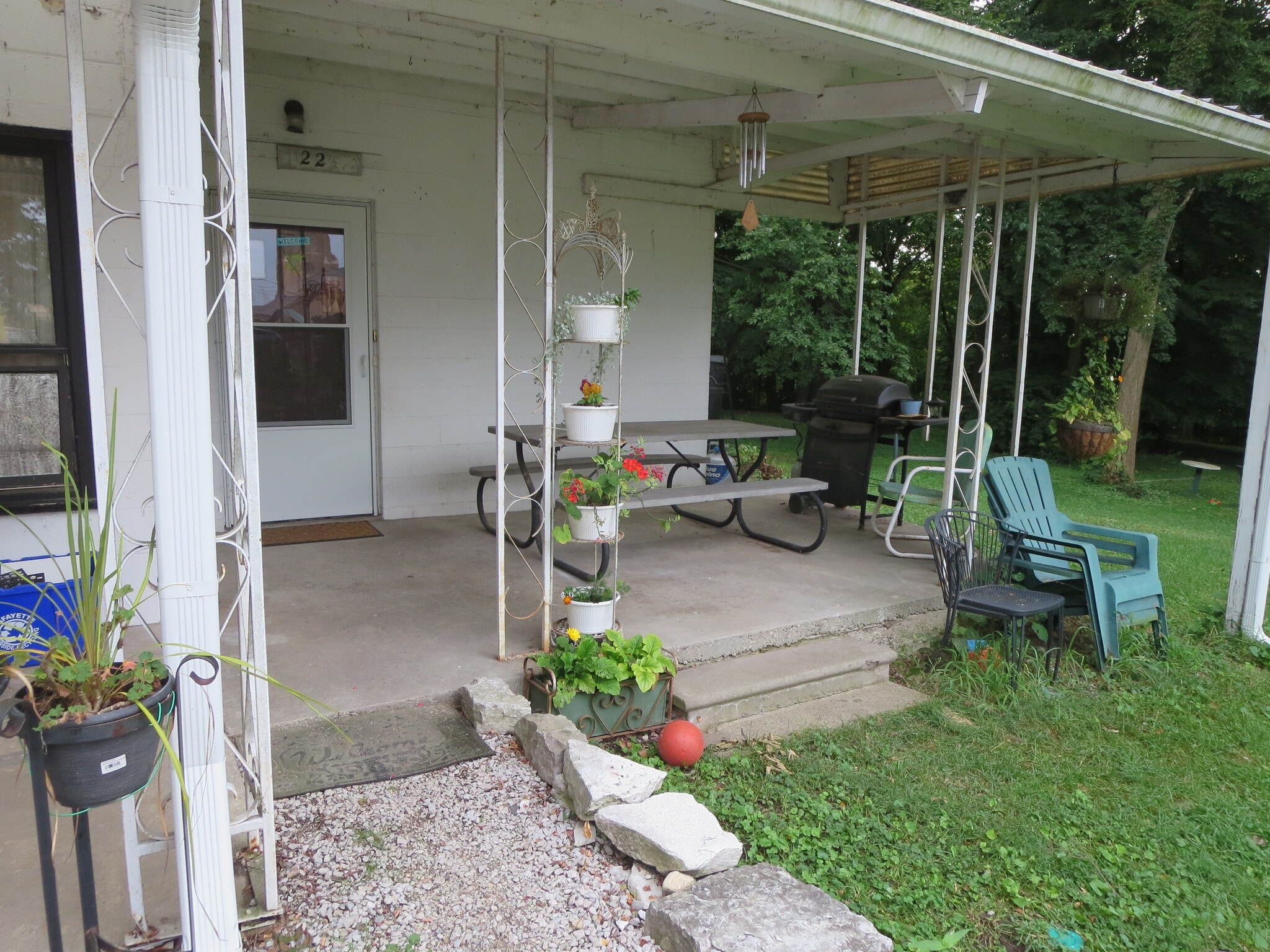 Porch with entry door. - 22 McGrath St