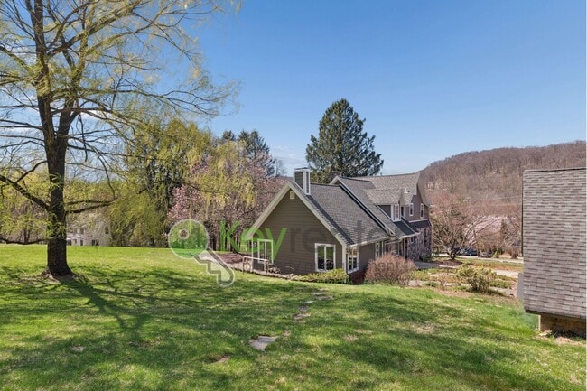Building Photo - Charming 4-Bedroom Home on 2 Acres—Woods, Trails & Exceptional Storage