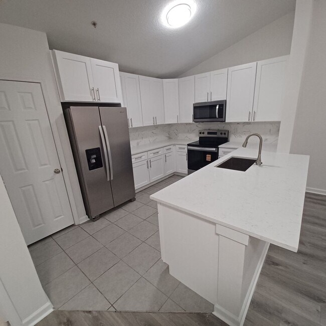 Building Photo - Cozy 1 BR 1 BA Condo