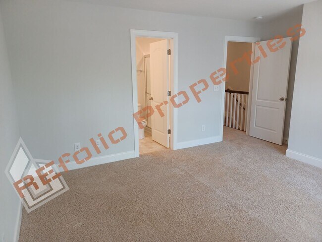 Building Photo - Built in 2022! 3 Story 3 Bedroom 1-Car Gar...