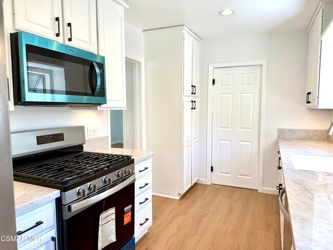 Building Photo - 7741 De Soto Ave