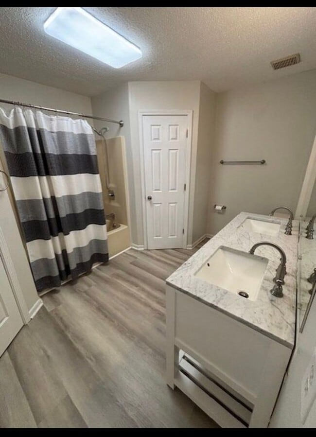 Building Photo - Affordable Living with Comfort & Convenience