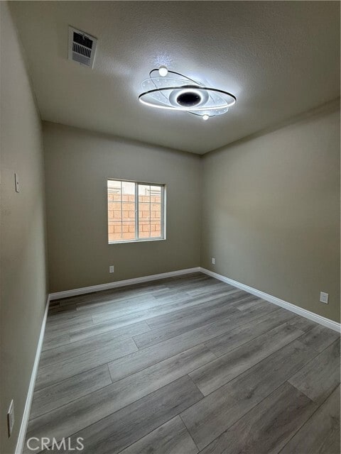 Building Photo - 7398 N Maple Ave