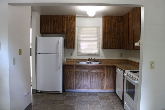 Building Photo - Live Close to It All: 2BR Condo Near CSU