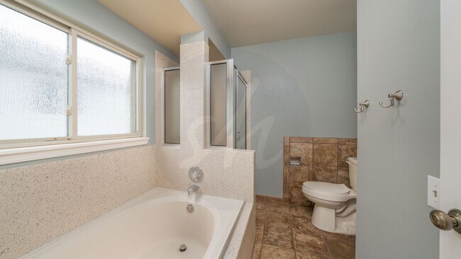 Building Photo - Four bedroom in Gatehouse Village with Fenced Yard and Views!