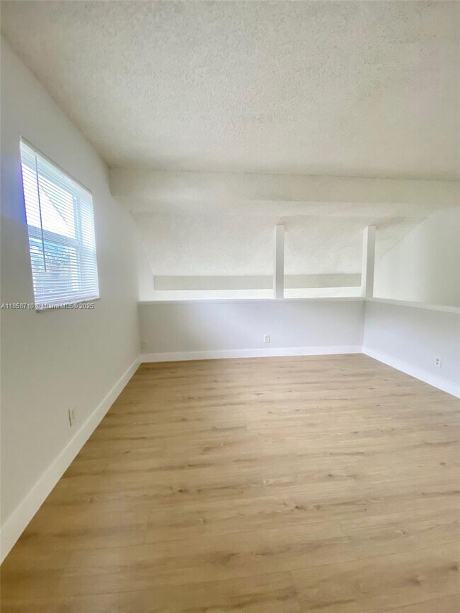 Building Photo - 3200 Coral Springs Dr
