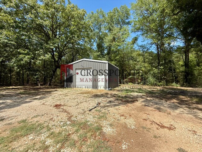 Building Photo - Tour Today! Spacious 4-Bedroom Home with Large Metal Building & Outdoor Kitchen