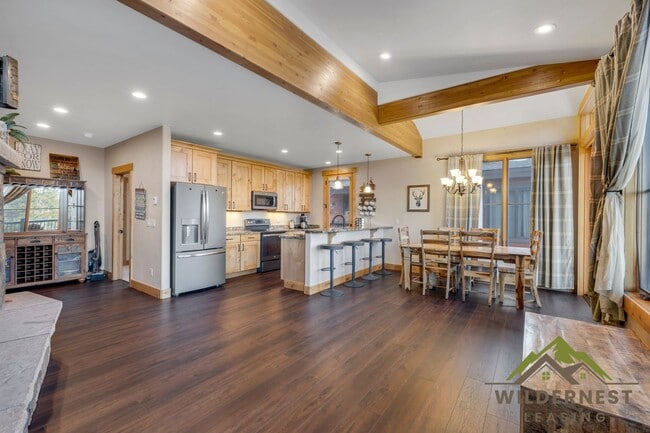 Building Photo - Beautiful Furnished Townhome with infared sauna, finished garage and community amenties