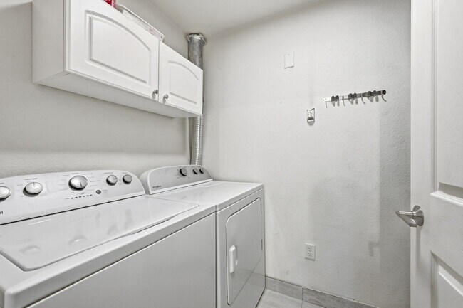Building Photo - $1,745.95 - Ground-Level 1 Bed + Flex Room | 1.5 Bath Condo with Community Pool