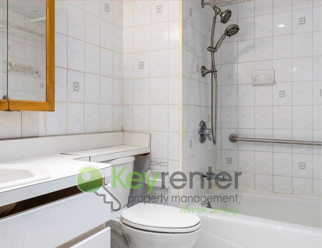 Building Photo - Spacious 2BR / 2.5BA Home with Huge Deck, Private Yard & Parking for 6