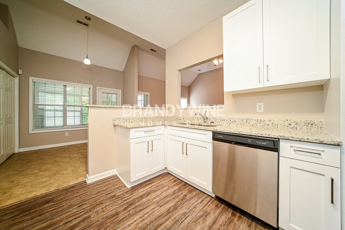 Building Photo - 6366 Wellesley Dr