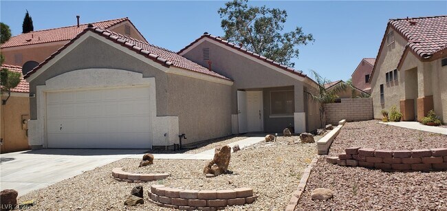 Building Photo - 8909 W Colorful Pines Ave