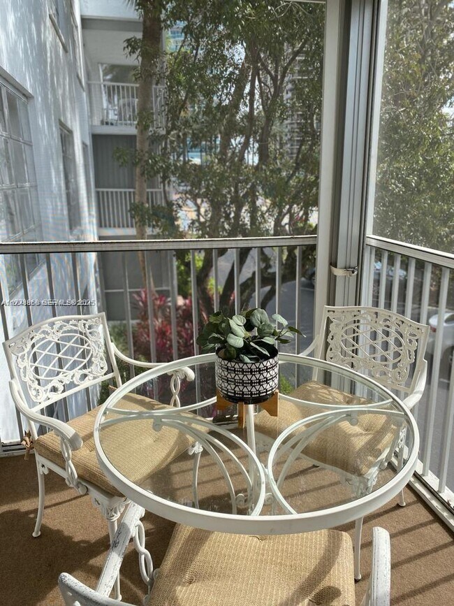 Building Photo - 10150 Collins Ave