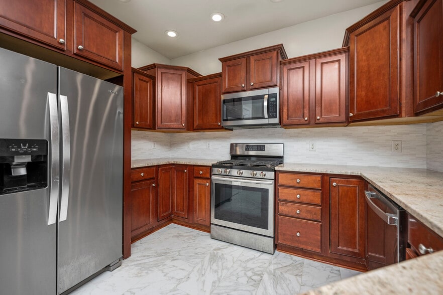 Kitchen with Stainless Steel Appliances and Gas Stove - 393 Hays Blvd