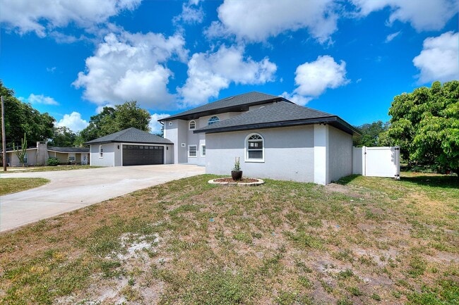 Building Photo - Rare Luxury Lease Opportunity | Spectacular 5-Bedroom Pool Estate on Nearly ¾ Acre Near Gulf Beaches