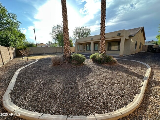 Building Photo - 15589 W Campbell Ave
