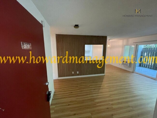 Building Photo - Bonus Den! Beautiful lower condo with large patio in Tara Hills, a resort style living complex!