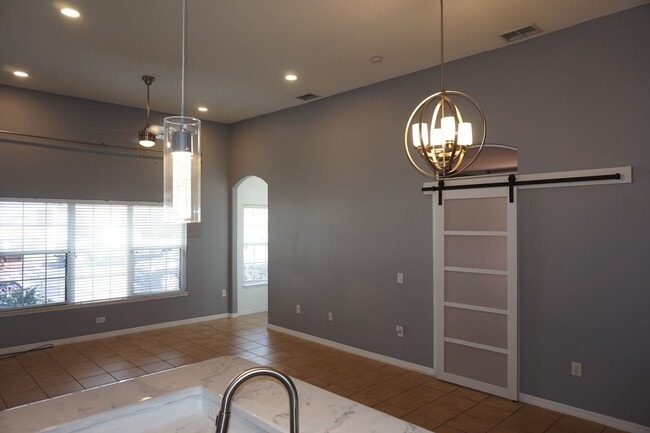 Building Photo - Designer 3/2 with 2 Car Garage in Desirabl...