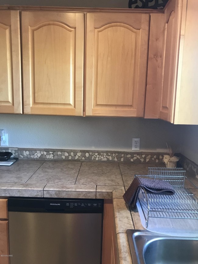 Building Photo - 7050 E Sunrise Dr