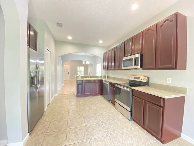 Building Photo - 5 bed / 2.5 bath Lake Nona Townhome!