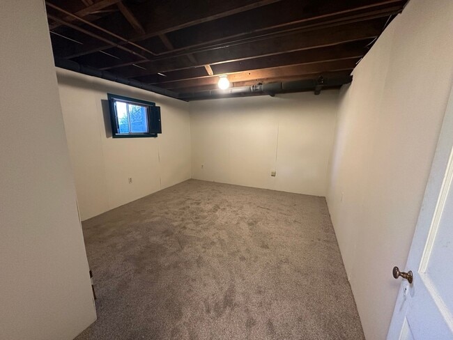 Building Photo - House in Bedford with Lot of Outdoor Space.