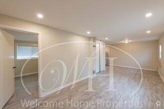 Building Photo - 1 bedroom with Peaceful Back Yard on Quiet...