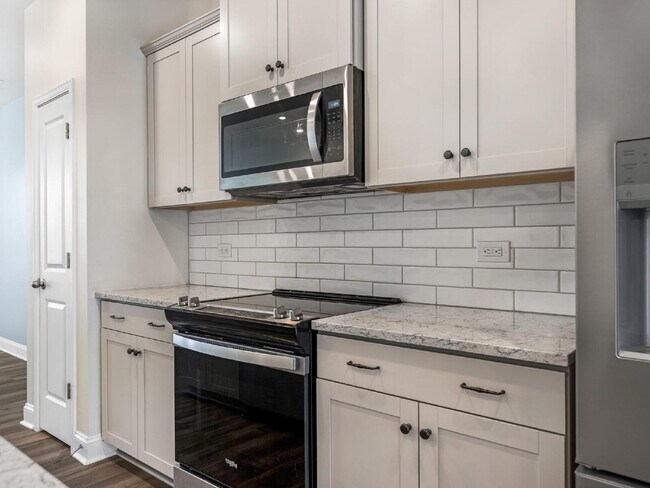 Building Photo - The Towns on Greenway! Two bedrooms. Two private baths, Half Bath. Greenway around the corner. Up...