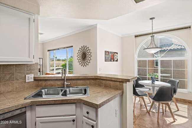 Building Photo - 9450 E Becker Ln