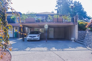 Carport space and Entrance to Apartment - 20010 Marine View Dr SW