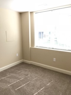 Second bedroom with a huge window complete with plantation blinds - 2312-A Belle Ave NE