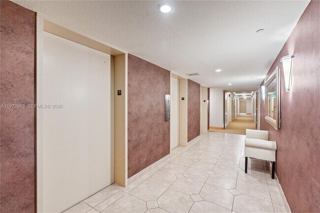 Building Photo - 3675 N Country Club Dr