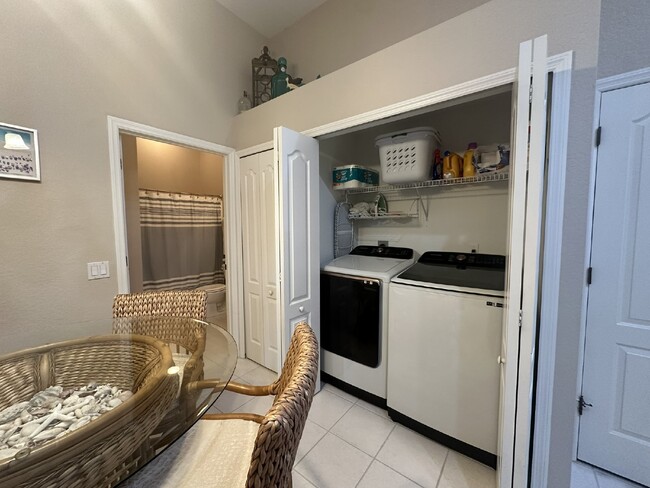 Building Photo - "Charming 2-Bed, 2-Bath Furnished Condo Oa...