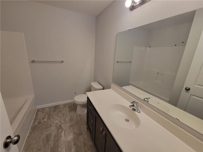 Building Photo - Modern 4-Bed Home with Open Layout, 3-Car ...