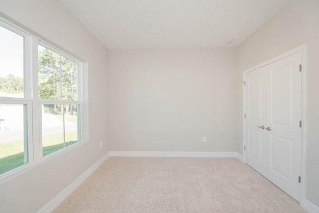 Building Photo - Peaceful and Private setting new construct...