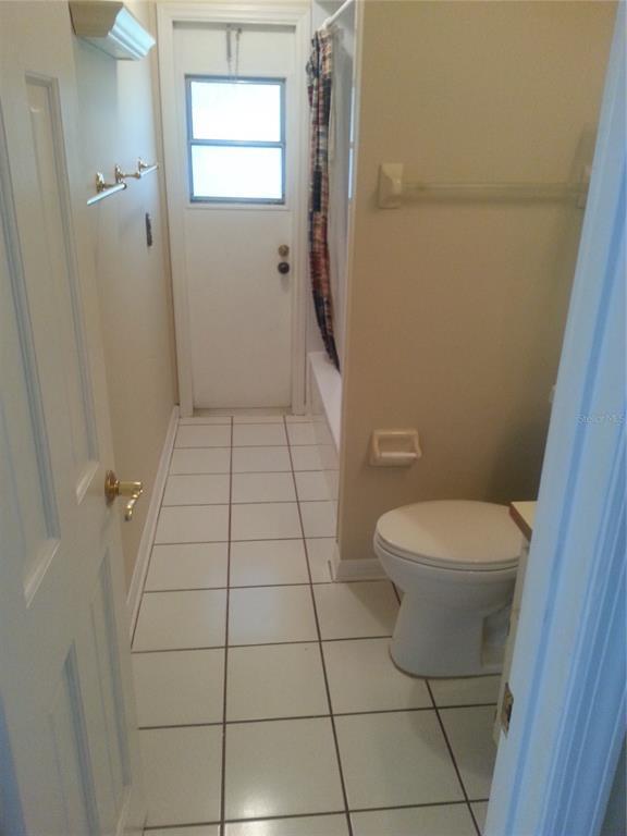 Building Photo - 9149 Palm Tree Dr