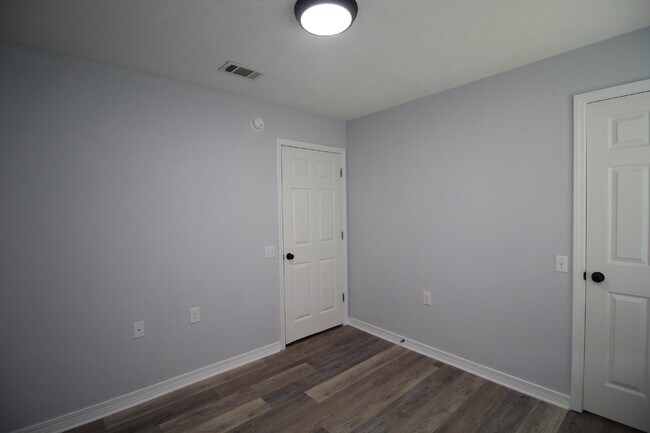 Building Photo - Updated Fox Hollow 3BR Home Near 9 Mile Rd with LVP Flooring, Granite Kitchen, 2-Car Garage & Fen...