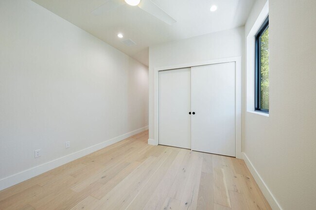 Building Photo - Luxury Redefined: Experience Vibrant Living in this 3-Bedroom Haven in East Austin