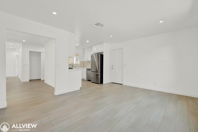 Building Photo - Fully Renovated 4-Bedroom Home with Firepl...