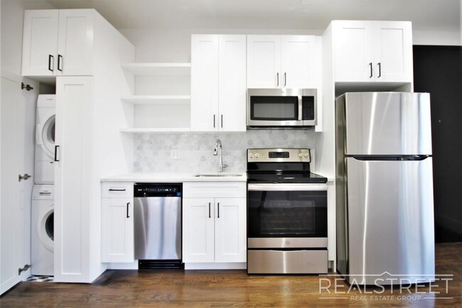 Building Photo - Stunning Brand New 2 BED with W/D in unit!