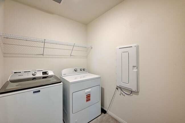Building Photo - Beautiful two-story rental home featuring 4 bedrooms, 3 bathrooms, and a 2-car garage.